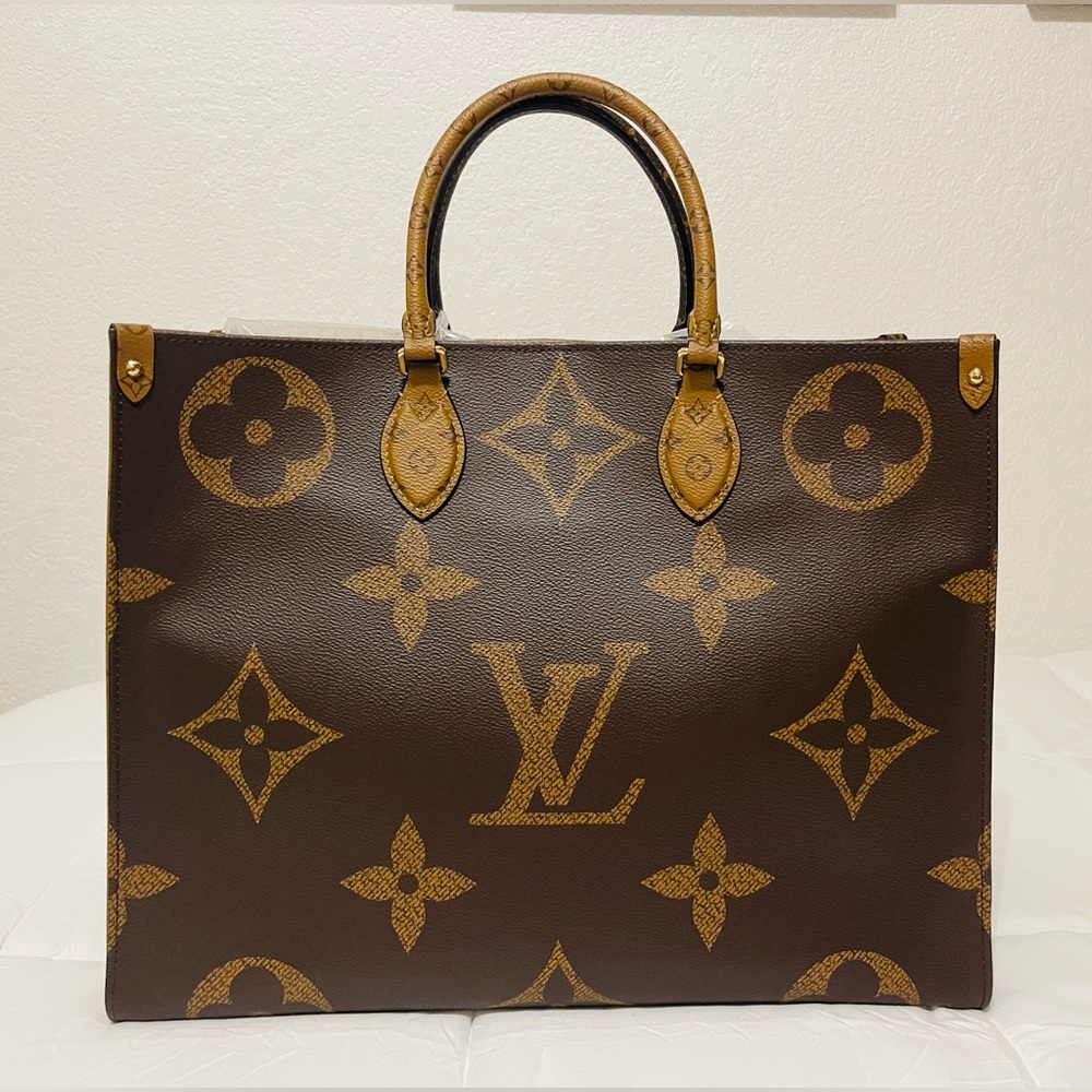 Authentic Louis Vuitton On The Go GM Tote in Reverse Monogram Canvas